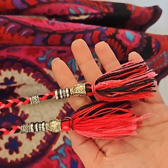 Colorful dress with beautifully stitched neckline and braided tie with bead ends - Picture 6 of 7